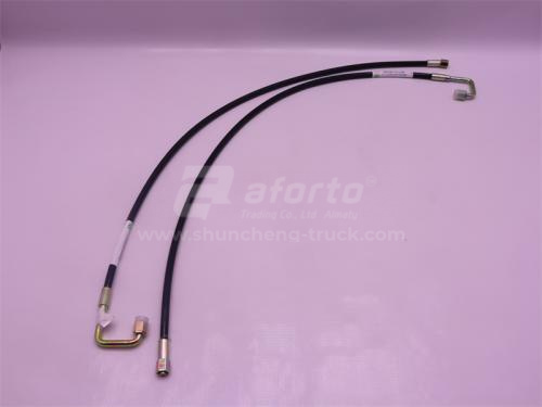 Шланг гидравлики подъема кабины HOWO TX380/TX400/TX440 900mm (оригинал)