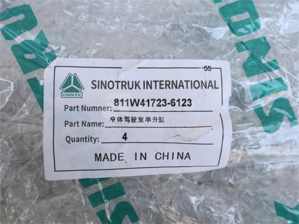 Гидроцилиндр подъема кабины HOWO T5G/TX (оригинал)