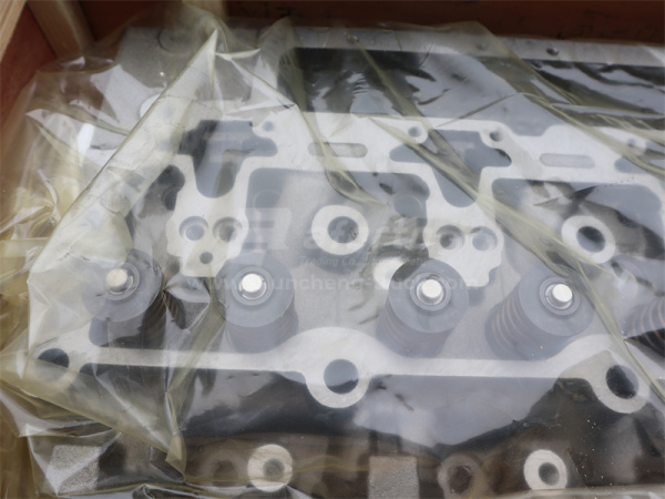 Головка блока 6CT/6CTA8.3-C215 в сборе с клапанами (оригинал)