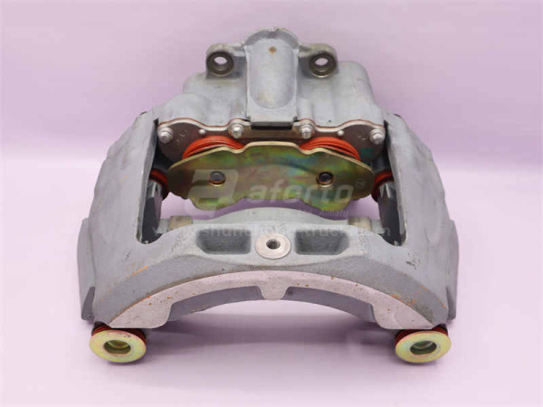 Суппорт тормозной правый в сборе HOWO 2013 (оригинал)