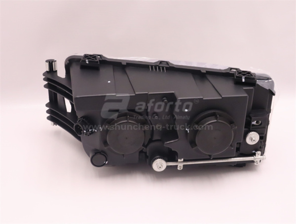 Фара HOWO T5G/C7H/TX левая (оригинал)