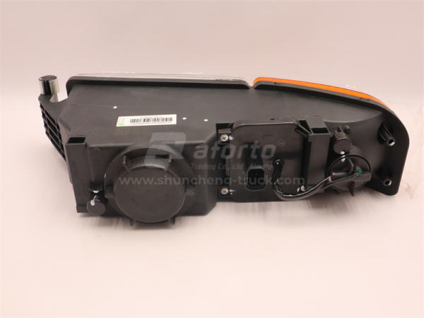 Фара HOWO  TX/SITRAK противотуманная низкий белый левая (оригинал)